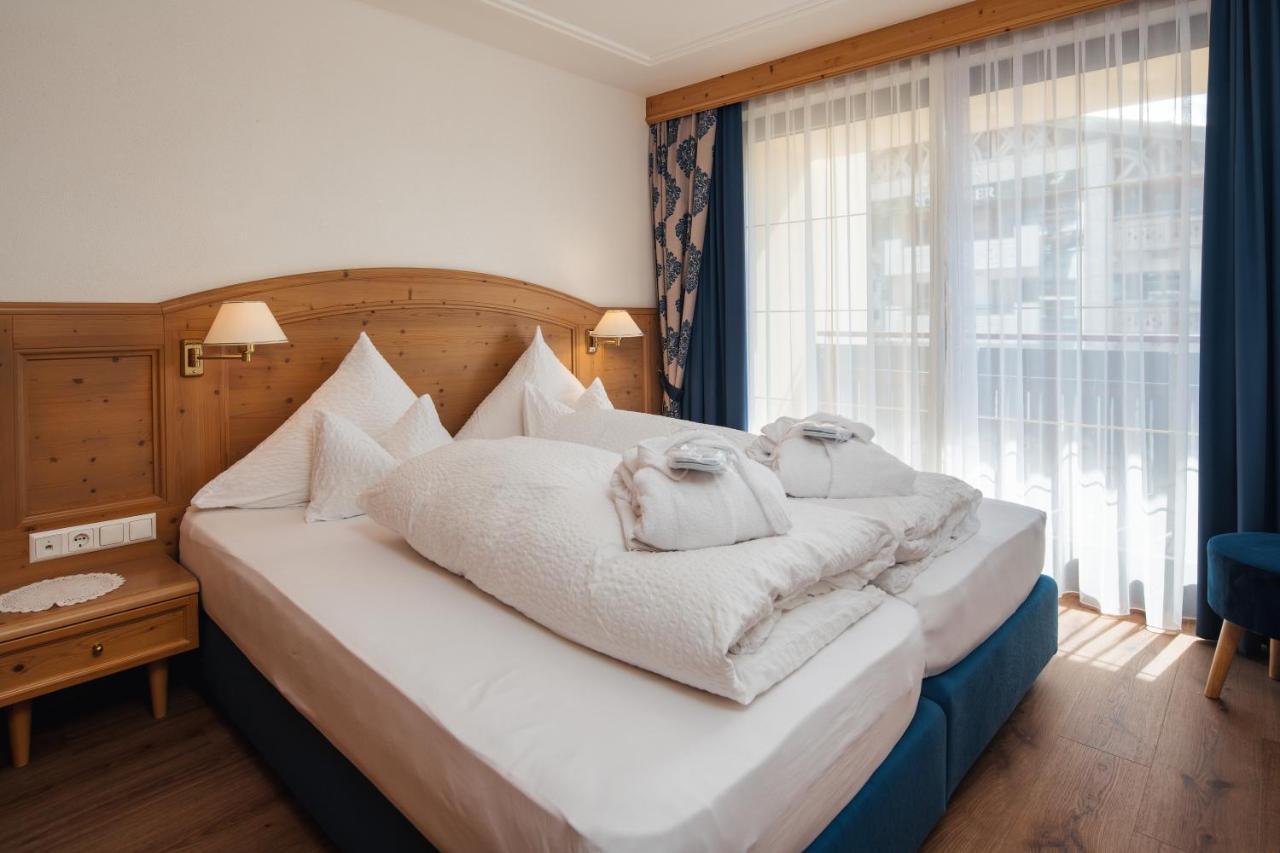 Hotel Garni Alpenruh-Micheluzzi แซร์เฟาส์ ภายนอก รูปภาพ